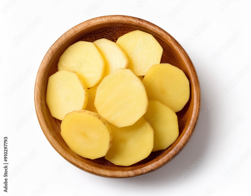 fresh potato slice in wooden bowl isolated on white background fresh potato slice in wooden bowl isolated on white background