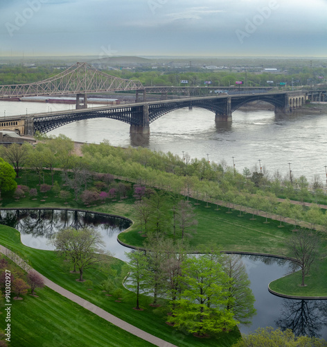 Obraz na płótnie Ariel view of riverfront in St Louis with view of Gateway Arches National Park and Eads Bridge on Mississippi River w salonie