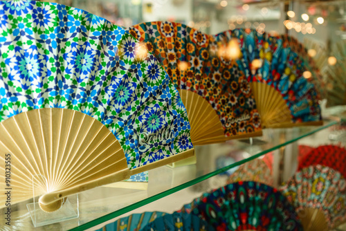 Colorful spanish fans displayed in a shop window
