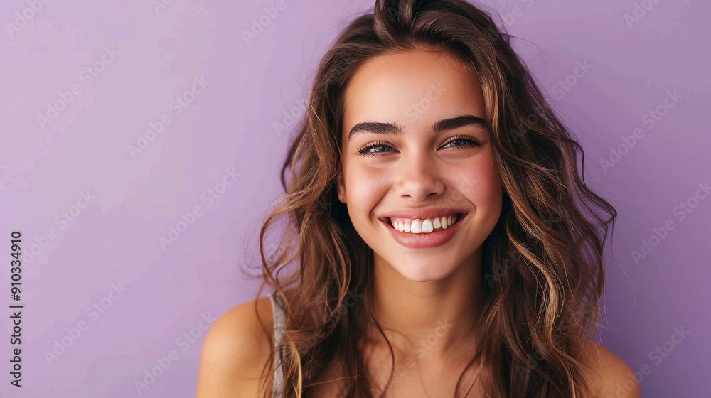 Happy woman isolated on pastel purple background Happy woman isolated on pastel purple background