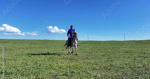 Wallpaper Mural person riding horse in lawn with wind power turbine Torontodigital.ca