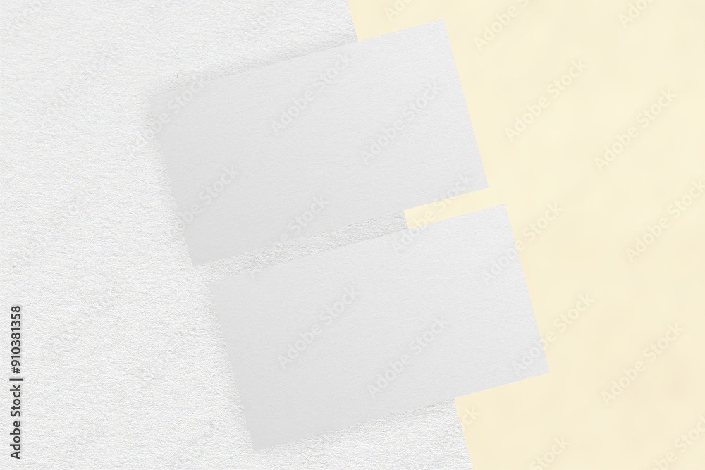 Textured business card mockup on a grey background
