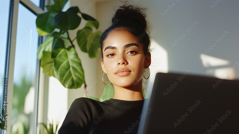Young latina woman, college student, studying online