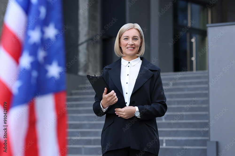 International relations. Diplomat with clipboard near flag of USA outdoors International relations. Diplomat with clipboard near flag of USA outdoors
