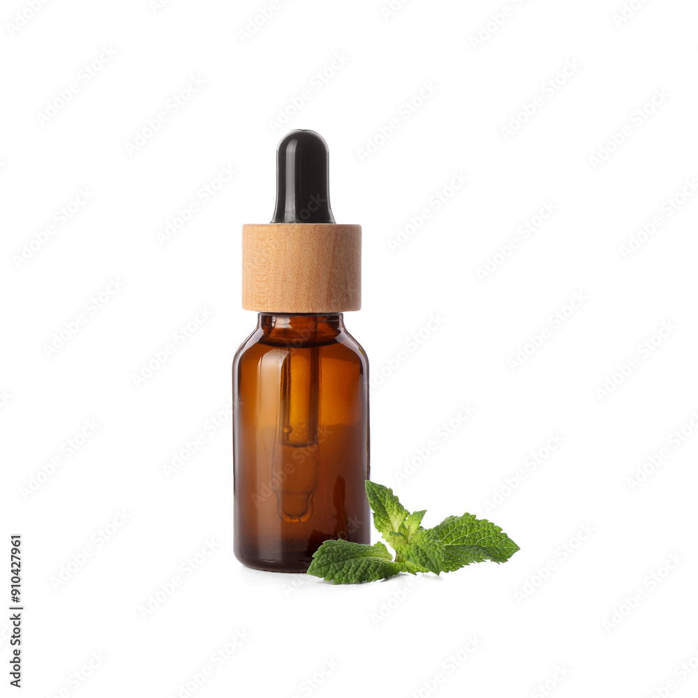Bottle of essential oil and mint isolated on white Bottle of essential oil and mint isolated on white