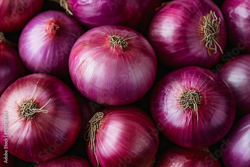 Photograph of a Close-Up of Fresh Red Onions: Emphasizing color and texture.