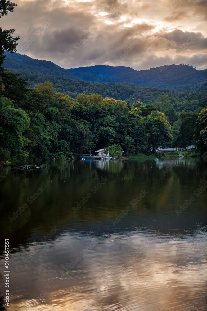 Angkaew lake Reservoir landscape with Doi Suthep mountains background at evening in cloudy day Angkaew lake Reservoir landscape with Doi Suthep mountains background at evening in cloudy day