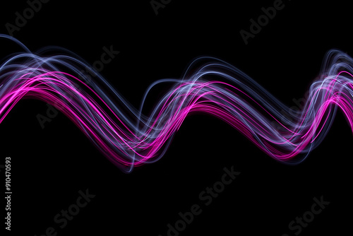 Long exposure photograph - Light Painting Photography - swirly waves of neon pink purple light against a black background