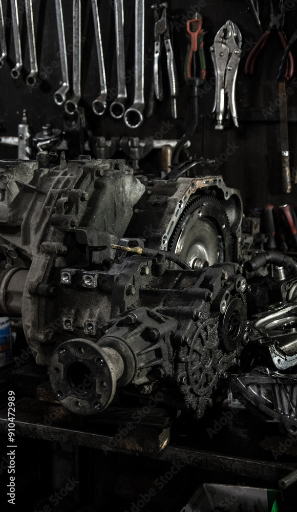 Car repair in a car workshop. Disassembled parts and tools. Car repair in a car workshop. Disassembled parts and tools.
