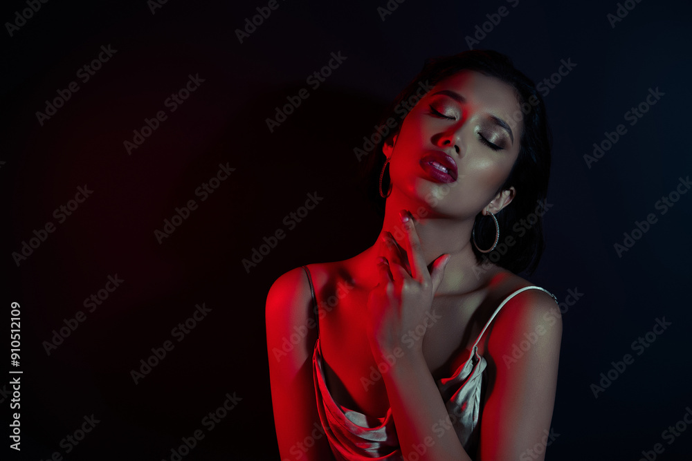 Photo of adorable pretty lady wear elegant dress touching neck empty space isolated black color background Photo of adorable pretty lady wear elegant dress touching neck empty space isolated black color background