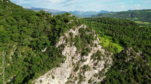 Panoramic mountain view near the village of Saou in the Drome department in France of the Vercors hills, the marly hills and the Val de Drome valley. The Saou forest and the 3 peaks - Drome Valley photo