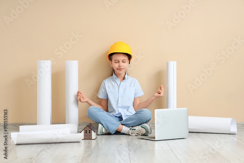 Little architect with lapto...