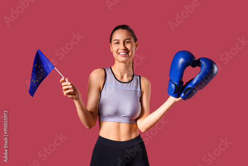 Female boxer with flag of E...