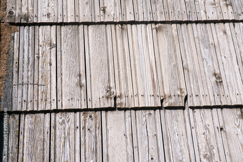 wood tile roof, a typical tradition of many mountain places due to the abundance of natural material. nailing makes them more solid tiles for snow and ice loads.