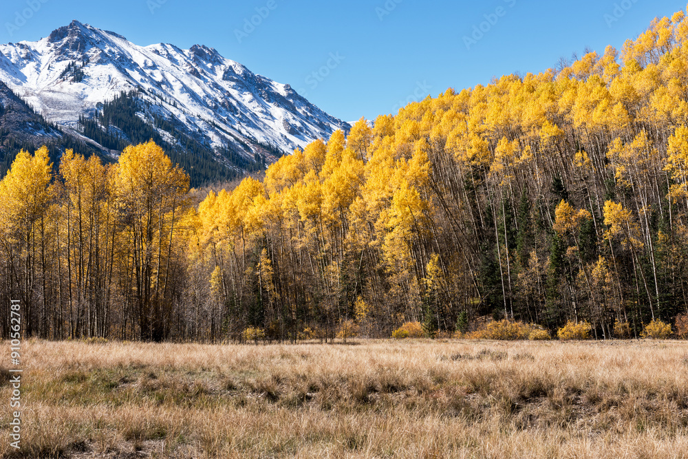 Early Fall snow capped peaks of the Elk Mountain Range rise above the colorful Castle Valley near the ghost town of Ashcroft Colorado. Early Fall snow capped peaks of the Elk Mountain Range rise above the colorful Castle Valley near the ghost town of Ashcroft Colorado.