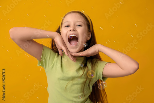 Surprised girl with soap bu...