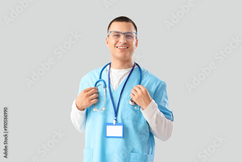 Handsome doctor with stetho...