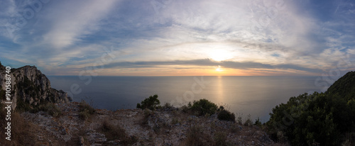 Amazing view at dusk down to the sea from the mountain in Othonoi island, north-west of Corfu, Greece photo