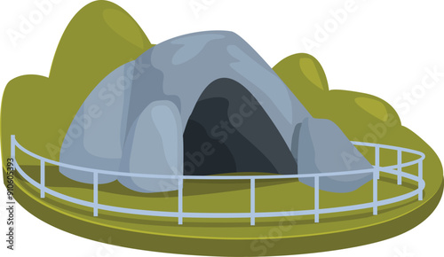 Stone age cave entrance surrounded by metal railing with green bushes in background