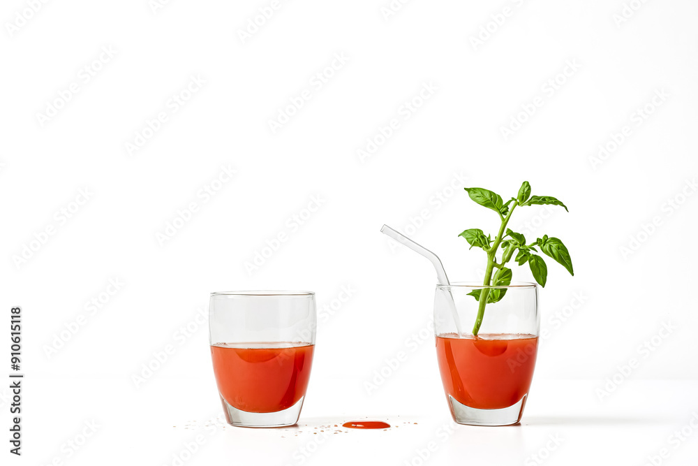 Tomato Juice with Basil and a Straw Tomato Juice with Basil and a Straw