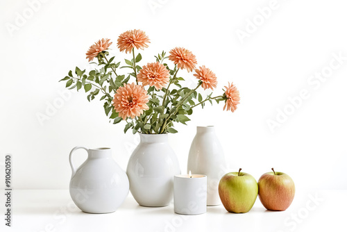 White Vase with Orange Flowers, Apples, and Candle on White Background