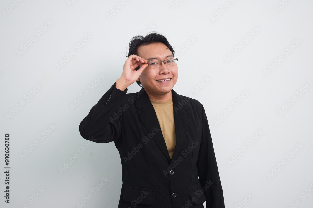Happy asian businessman Holding eyelet of glasses isolated white background Happy asian businessman Holding eyelet of glasses isolated white background