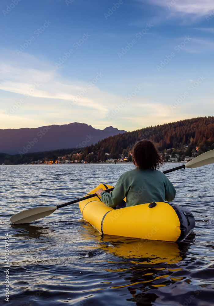 Φωτογραφία Adventurous Woman Kayaking on an Inflatable Kayak in the Pacific Ocean