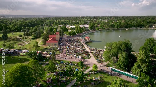 Crowd at family-friendly City Park Jazz summer event, Denver Ferril Lake, aerial photo