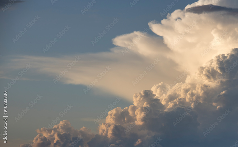 The sky is filled with clouds, and the sun is shining through them The sky is filled with clouds, and the sun is shining through them
