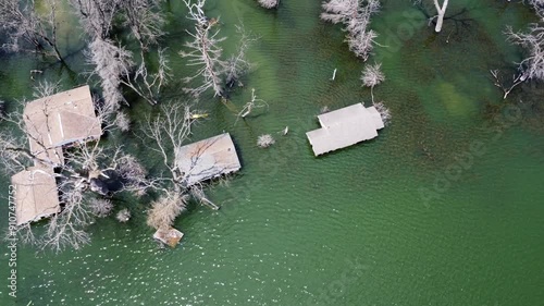 Climate Change And Global Warming Causing Catastrophic Weather Patterns And Natural Disasters In Modern History. Aerial View Of Dead Trees And Submerged Homes In A Rural Lake Town Of Wisconsin, USA. photo