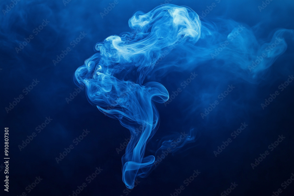 Fototapeta premium Ethereal Moments: A Wisp of Smoke Captured on a Deep Blue Background