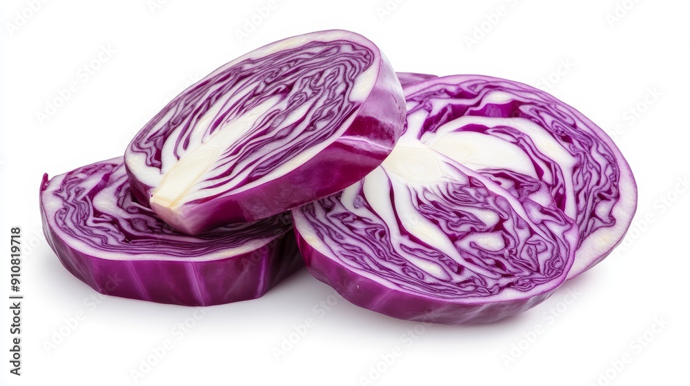Fresh red cabbage sliced into thin, crisp rings, showcasing the deep purple color and white veins. Isolated against a clean white backdrop Fresh red cabbage sliced into thin, crisp rings, showcasing the deep purple color and white veins. Isolated against a clean white backdrop