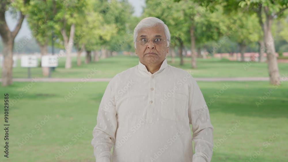 Angry Indian old man shouting on someone in park Angry Indian old man shouting on someone in park