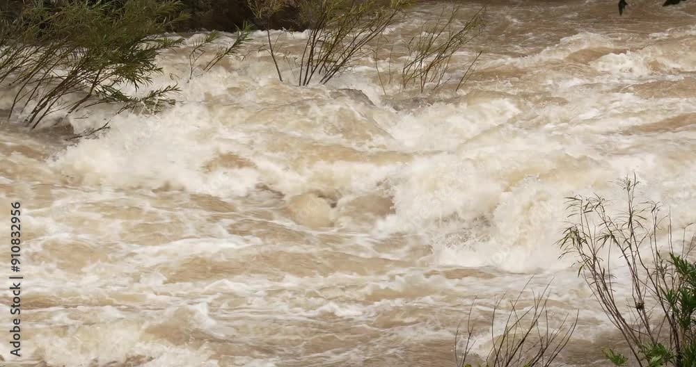 Close up flash flood flows after a heavy rainstorm. Power waterfall, Water from the mountain.