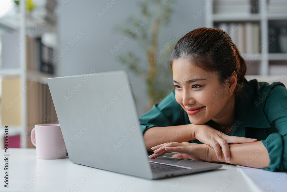 Asian businesswoman who is tired and sleepy from sitting at a desk for a long time. Works in financial documents, accounting, statistics and has office syndrome. Asian businesswoman who is tired and sleepy from sitting at a desk for a long time. Works in financial documents, accounting, statistics and has office syndrome.