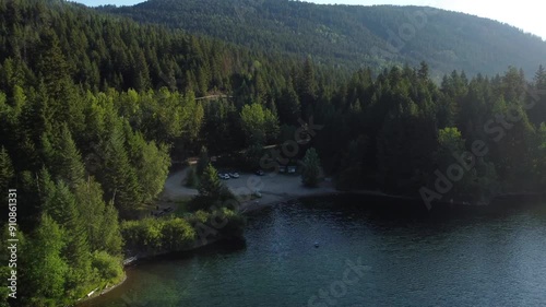 Drone shot natural forest and blue lake environment, British Columbia Canada photo