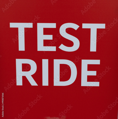 Test ride or test drive sign on red background. Test drive new car sign.