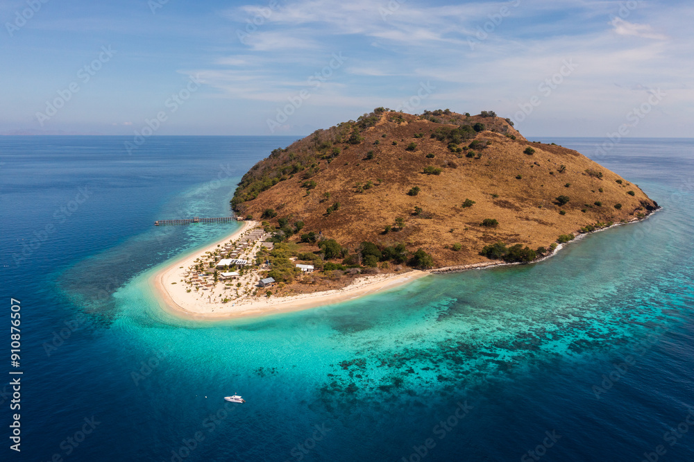 Labuan Bajo, Indonesia: Aerial view of an idyllic island surrounded by a coral reef in Flores in Labuan Bajo in the Komodo area in Indonesia