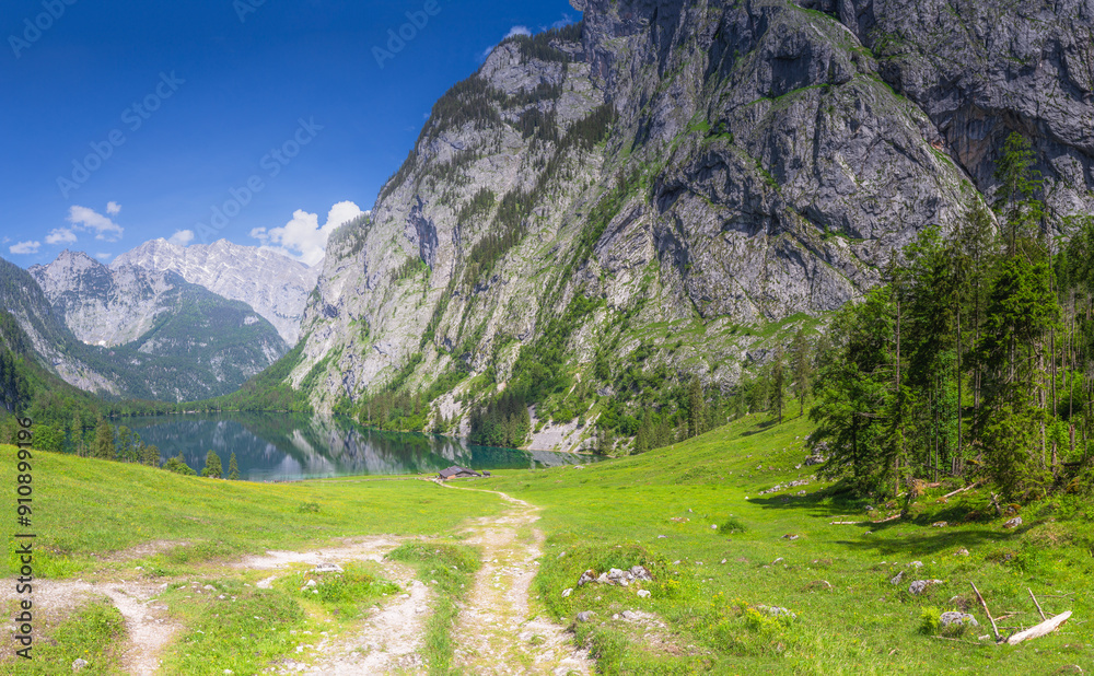 Mountain valley with tracks near Obersee lake in Berchtesgaden National Park Mountain valley with tracks near Obersee lake in Berchtesgaden National Park