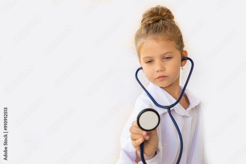 Cute little girl in white doctor coat with stethoscope on white background Cute little girl in white doctor coat with stethoscope on white background