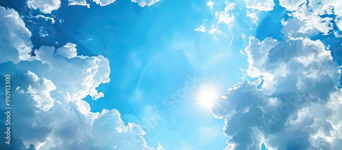 The expansive blue sky with fluffy clouds perfect for a copy space image