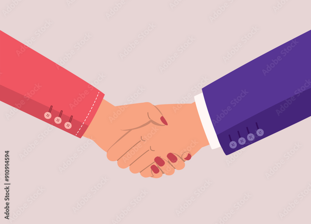 Male And Female’s Hand In Businesswear Shaking Hands. Male And Female’s Hand In Businesswear Shaking Hands.