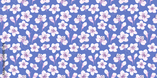 Abstract artistic florals pattern on a blue background. Vector hand drawing. Ditsy tiny flowers and small buds seamless print. Designs ornaments for textiles, fabric, cover