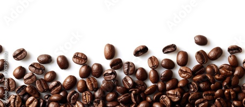 Scattering a few coffee beans around a copy space image photo