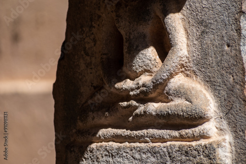 Ancient carving of a Jain monk meditating on a pillar of an old temple in Shravanabelagola photo