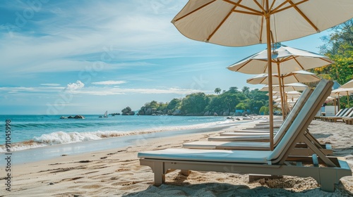An idyllic beach scene featuring several wooden lounge chairs under large umbrellas, perfectly arranged along the sandy shore, inviting viewers to unwind and enjoy the tropical setting.