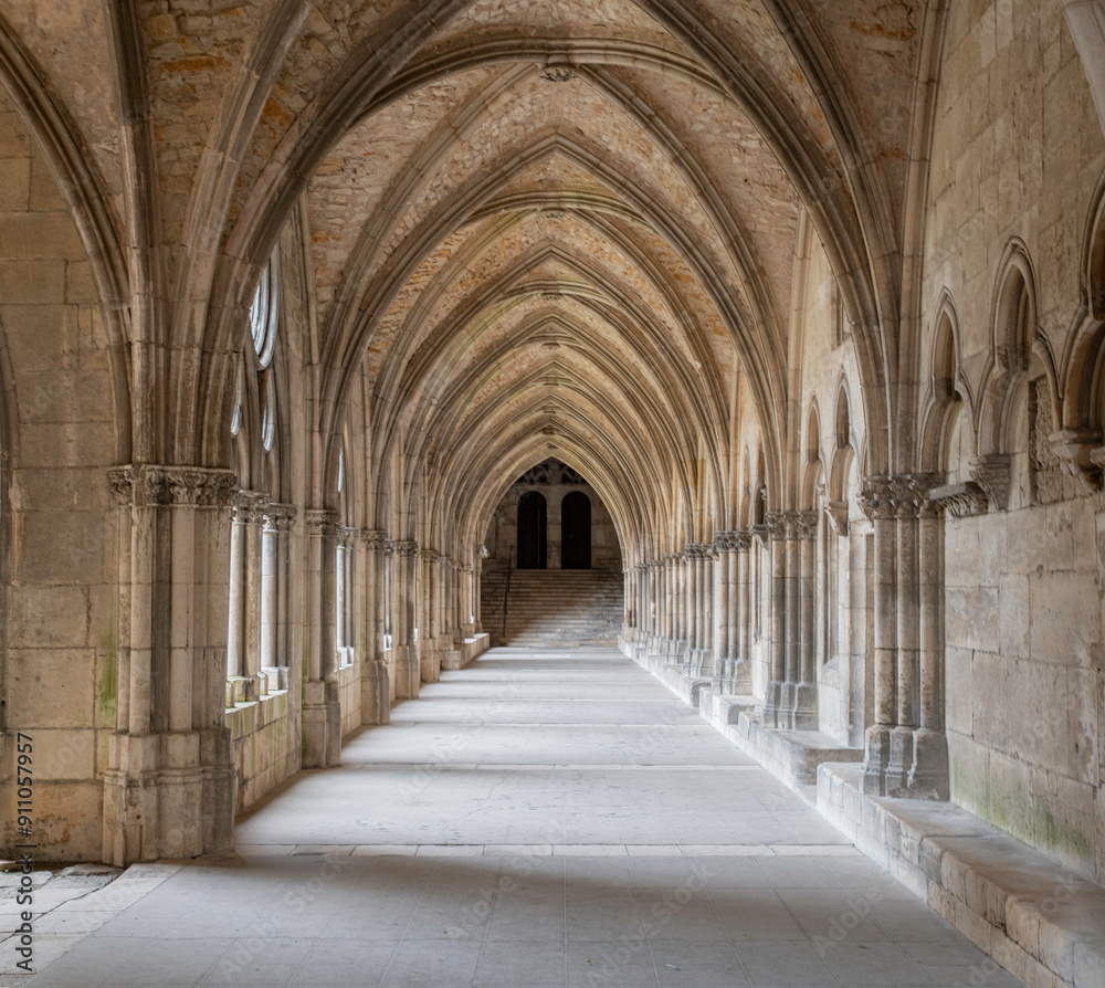 a old corridor with arches in the cathedral of Toul in France a old corridor with arches in the cathedral of Toul in France