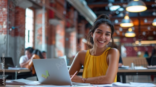 The smiling woman at laptop photo