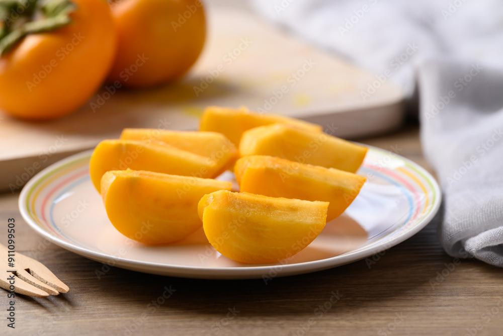 Sliced ripe persimmon ready to eating, Autumn fruit Sliced ripe persimmon ready to eating, Autumn fruit