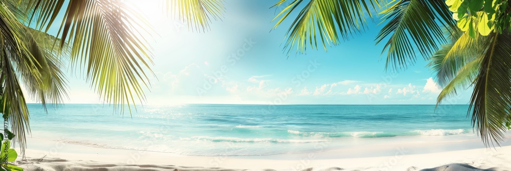 Obraz premium A tropical beach scene with palm leaves framing the tranquil sea, reflecting blue skies and evoking feelings of peace and natural beauty.